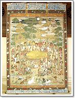 釈迦と多くの弟子や動物を描かれた献本着色涅槃図の写真